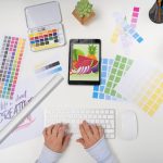 top-view-graphic-designer-with-tablet_23-2149142154
